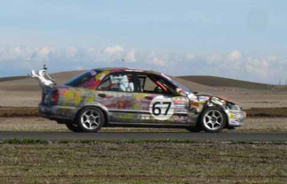 Illustration for article titled Finally, The Thunderhill 24 Hours of LeMons Uber Gallery!